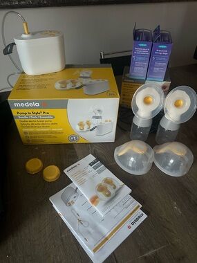Medela Pump In Style Pro Double Electric Breast Pump in White and Yellow